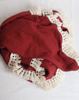 Burgundy cotton baby blanket with tassels for newborns