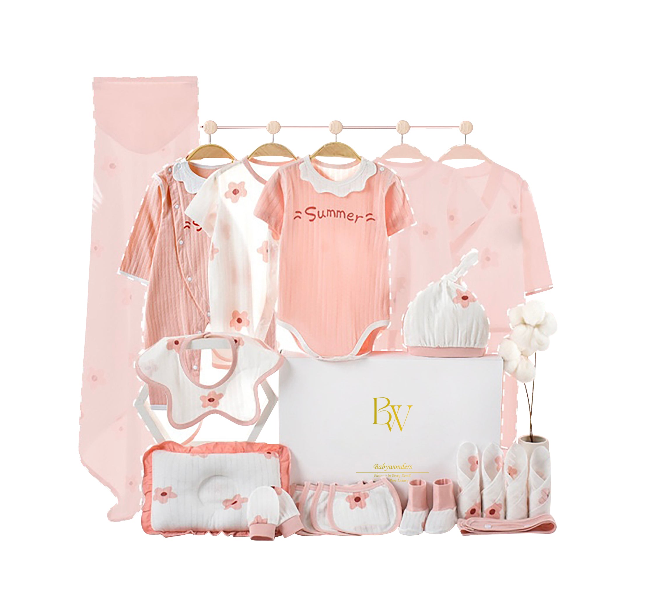 Close-up of newborn essentials with pink and floral designs, perfect for summer baby gifting
