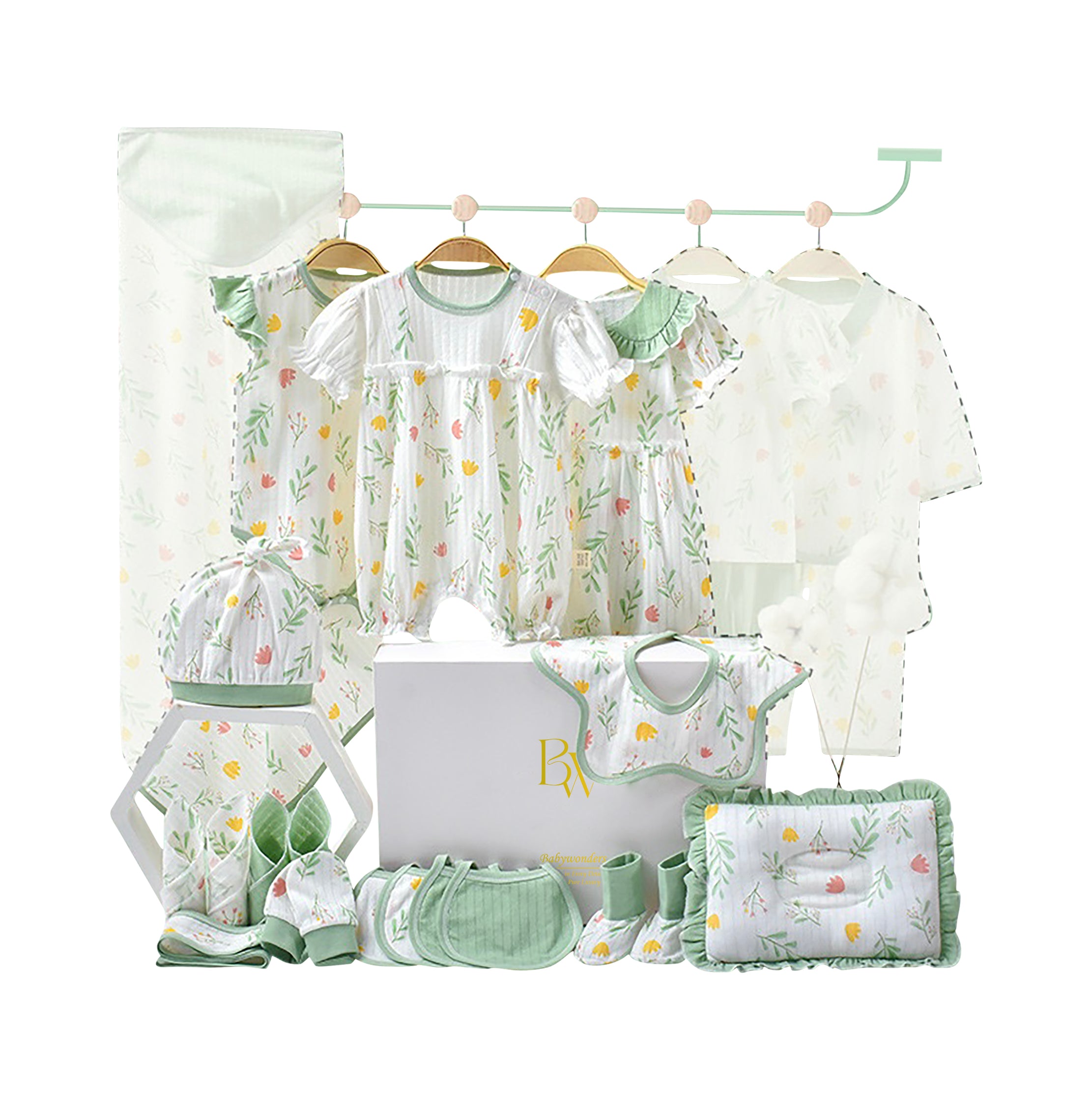 Close-up of glitter-accented baby clothing with summer floral print and matching accessories