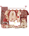 baby gift set with bear clothes, socks, and wrap