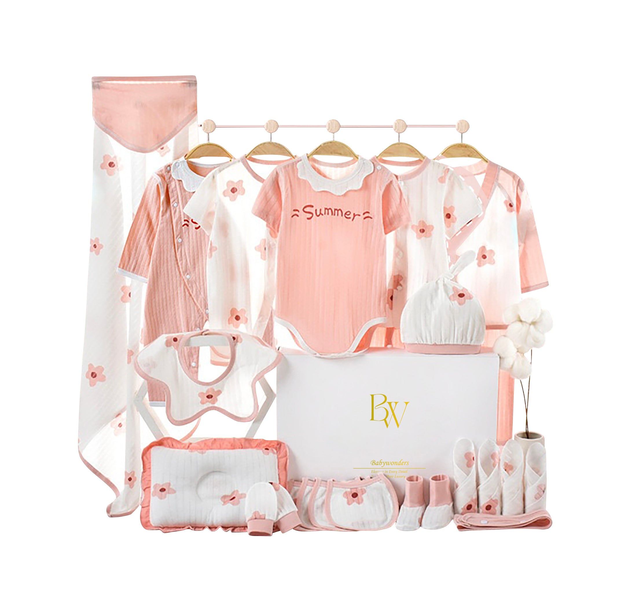Pink summer floral baby gift set with wrap, bodysuit, socks, bibs, towel, and pillow in a gift box