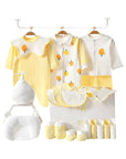 Newborn essentials set with warm-toned tree motif, ideal for baby showers or woodland-themed gifts