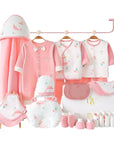 Close-up of baby clothing with dolphin print and coordinating accessories, perfect for newborn gifting