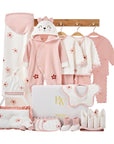 Newborn gift set with baby clothes and floral socks