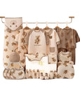 baby gift set with bear clothes, socks, and wrap