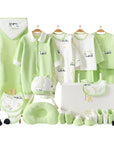 Green panda-themed baby gift set with bodysuit, bibs, wrap, socks, gloves, towel, and pillow in a gift box