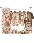 baby gift set with bear clothes, socks, and wrap