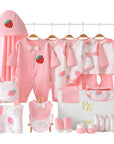 Strawberry-themed baby gift set with bodysuit, bibs, socks, towel, wrap, pillow, and gloves in a coordinated gift box