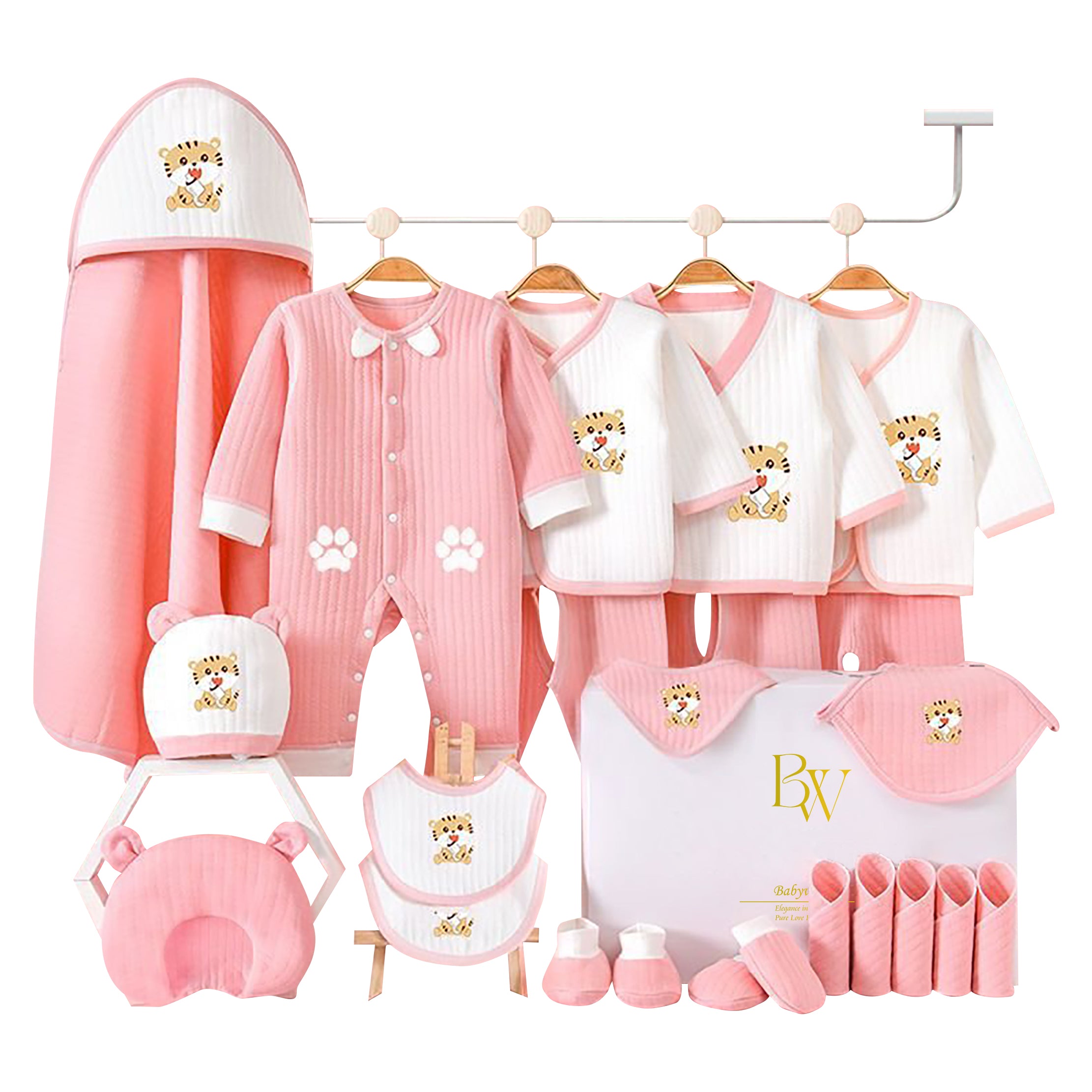 Close-up of tiger-print baby bodysuit and accessories, ideal for newborn gifting