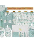 Animal-themed newborn gift set with cozy accessories and playful bear motif for baby shower gifting
