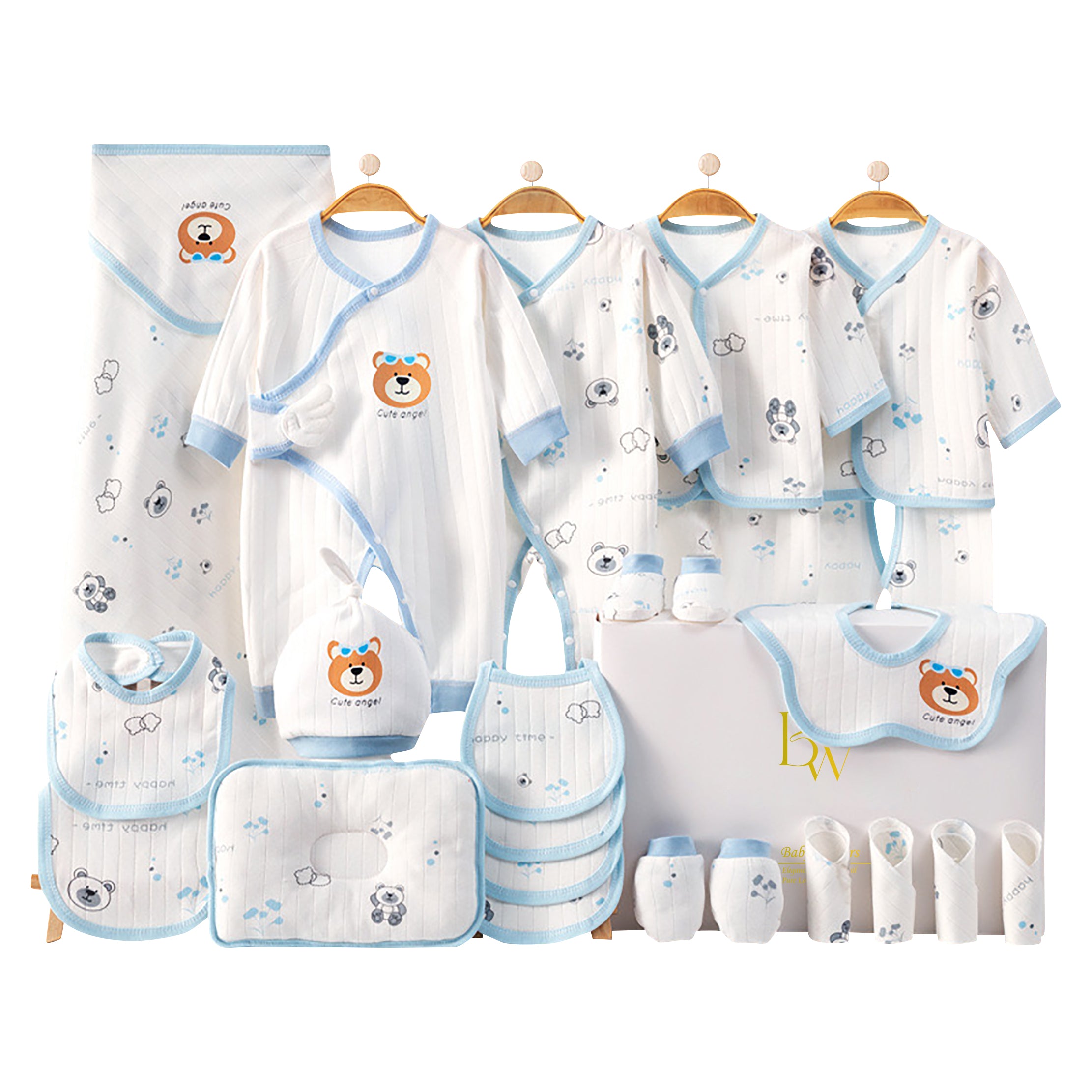 Close-up of cute bear print on baby onesie with matching gloves and socks