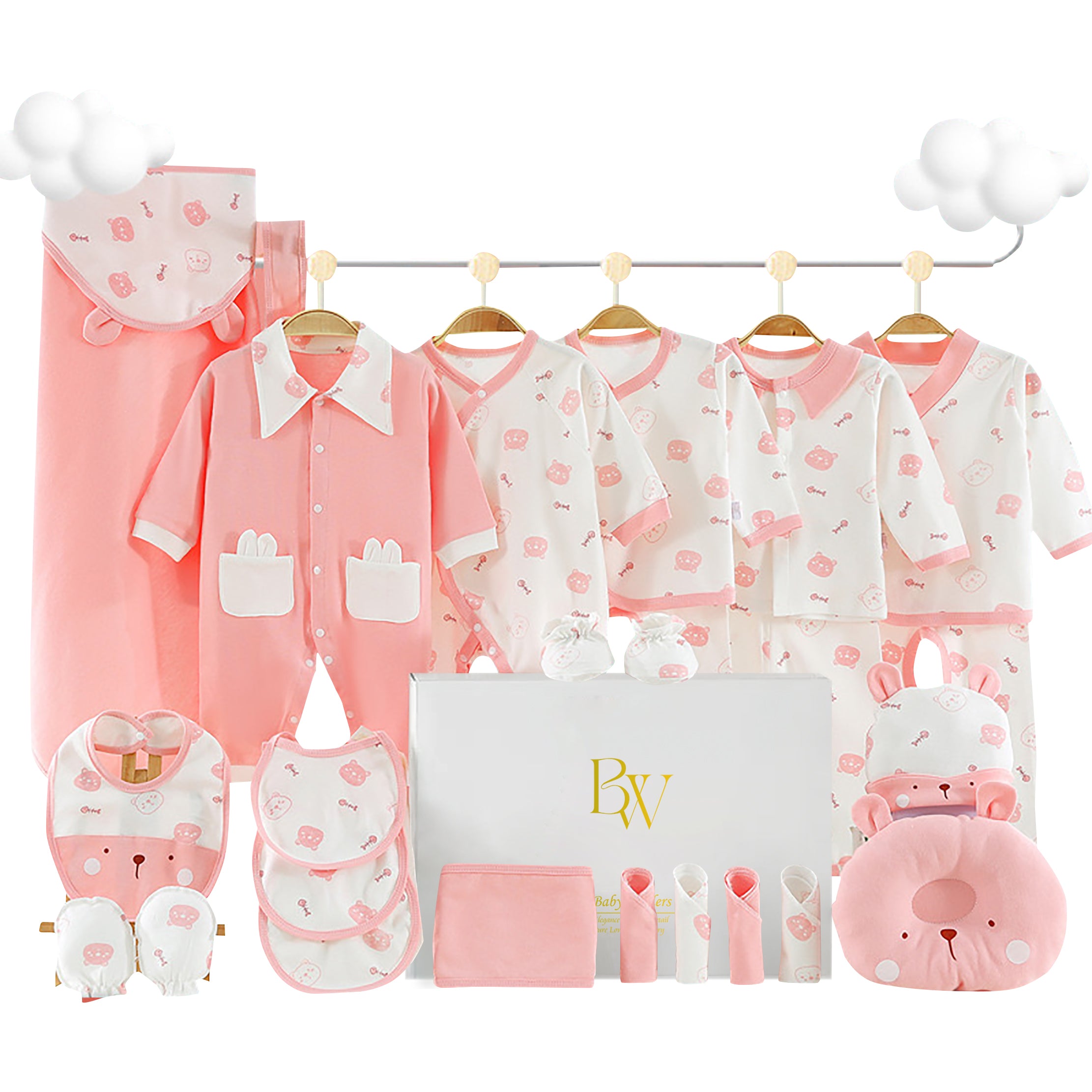Close-up of cotton baby bodysuit featuring bear and fish bone design, paired with newborn essentials