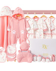 Kitten-themed baby gift set with claw-print onesie, mittens, and socks in a gift box