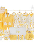 Bear and fish bone-themed baby gift set with matching bodysuit, socks, and mittens in a gift box