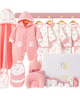 Soft baby gift set with cat-themed bodysuit, tiny mittens, and cozy socks for newborns