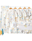 Close-up of soft cotton baby bodysuit with cute elephant print and matching accessories