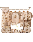 baby gift set with bear clothes, socks, and wrap