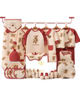 baby gift set with bear clothes, socks, and wrap