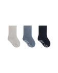 Three pairs of socks in gray, blue, and black on a white background