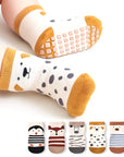 Children's socks with animal designs and patterns on a white background
