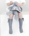 Charcoal gray baby lace knee-high socks with ribbon bow, cute toddler outfit style