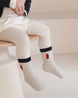 Baby wearing navy stripe cotton socks – cozy and breathable BabyWonders UK design