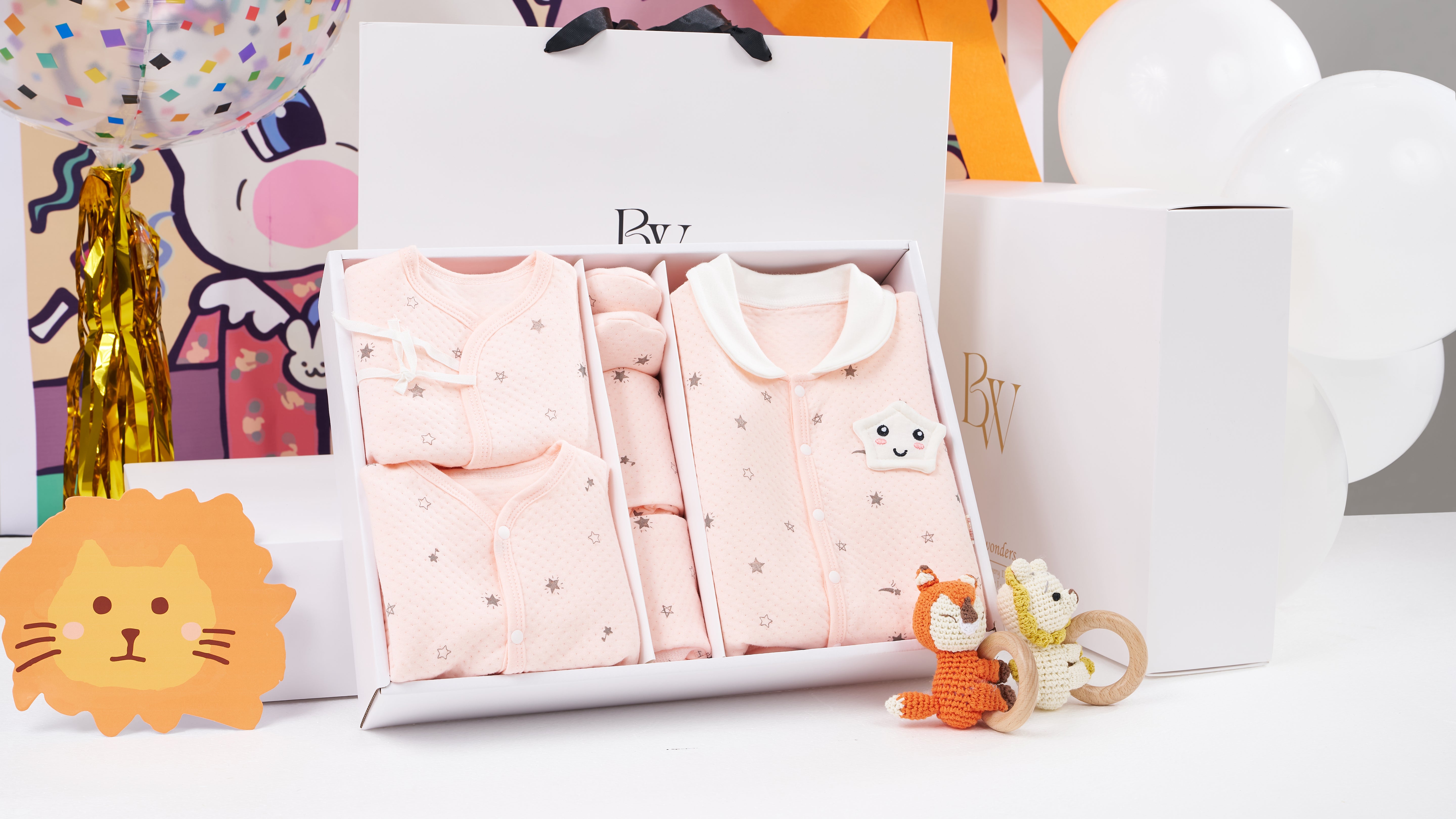 Beautifully packaged Babywonders baby gift set with rompers and accessories inside gift box
