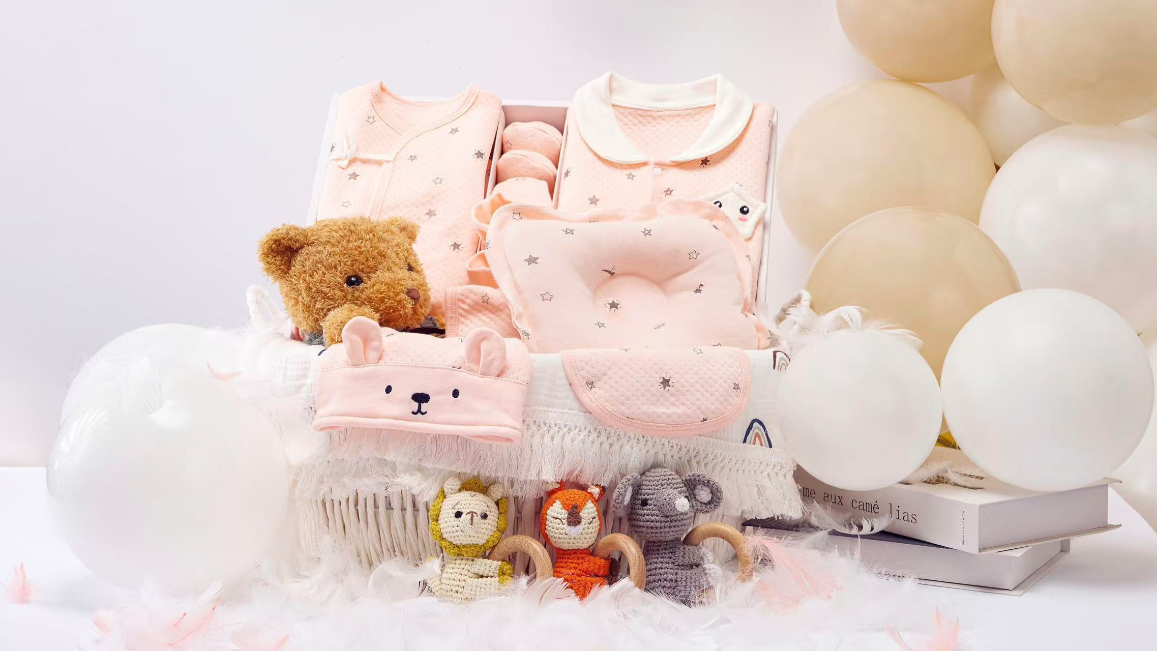 Open baby girl gift set from Babywonders UK – includes swaddle, bodysuit, bonnet and socks, beautifully displayed for newborn gifting