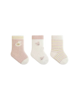 Three pairs of baby socks with decorative buttons on a white background