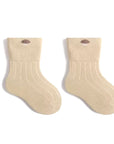 Pair of beige cotton baby socks suitable for boys and girls