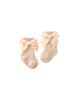 Beige cotton baby socks with velvet bow — neutral tone for minimalist baby outfits.