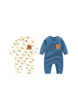Set of two cotton baby rompers in blue and beige with cute puppy pattern and front pockets.