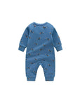 Back view of blue cotton baby romper featuring all-over puppy print pattern.