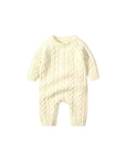 Baby cable knit romper front view with textured knit pattern and button fastening