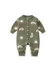 Back view of army green knitted baby romper with white sun and rainbow design, cozy and unisex for newborns 0–12 months.