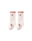 Cream ribbed cotton baby socks with daisy embroidery and lettuce-edge cuff