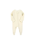 cream baby sleeper with subtle vertical beige stripes