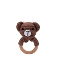 Handcrafted crochet teddy bear rattle with natural wooden teething ring for babies, sensory toy and newborn baby gift.