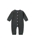 Front view of dark gray ribbed cotton baby jumpsuit – unisex long sleeve romper for newborns.