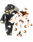 Set of two plush fleece baby rompers with dinosaur and croissant patterns, hooded and soft for winter