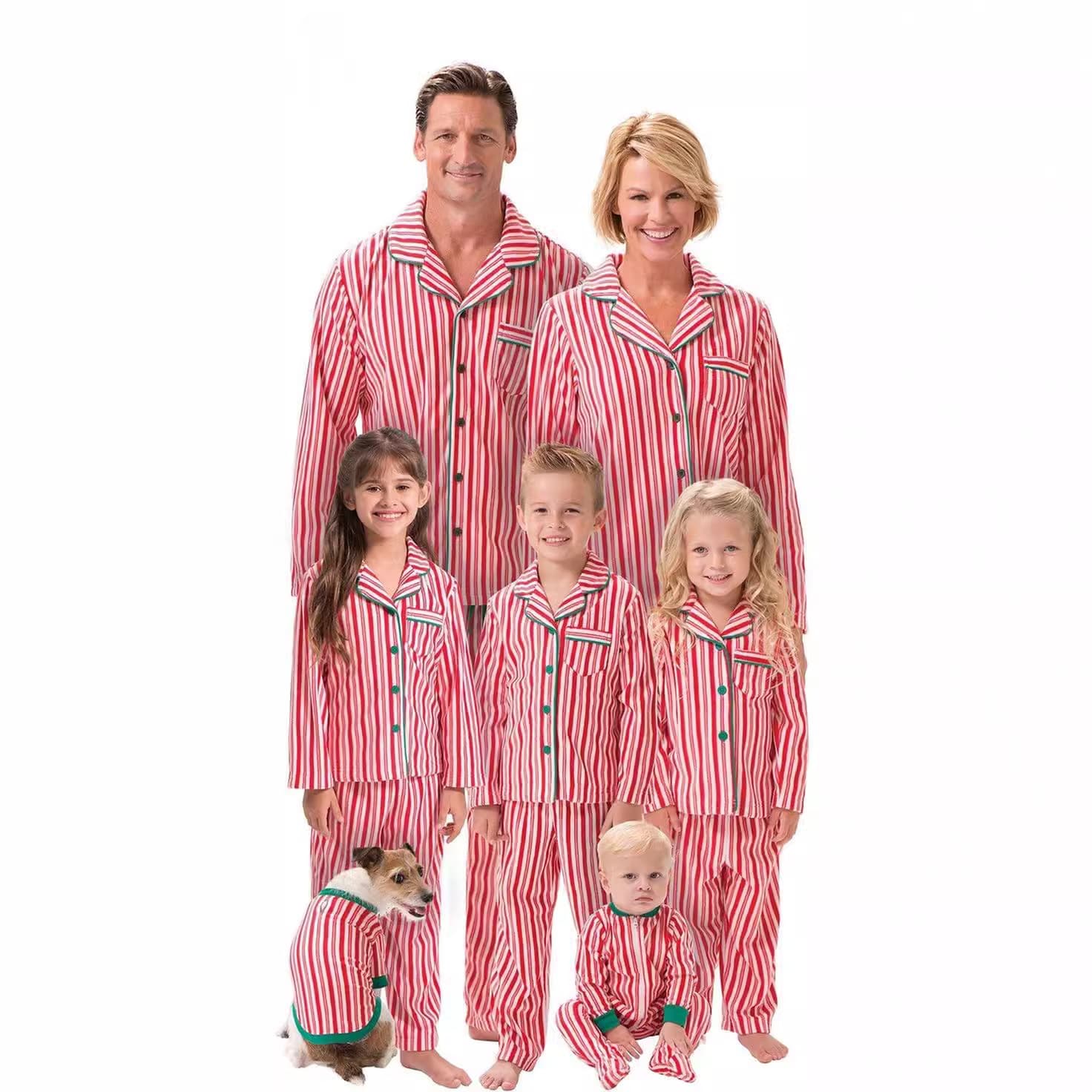 Family in matching red and white striped Christmas pajamas with kids, baby, and dog