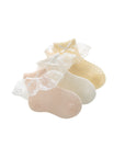 Set of lace bow baby socks in pastel pink, white, and yellow