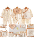 Close-up of baby clothing and accessories featuring ‘Love Baby’ text and heart-themed accents