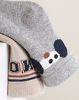 Close-up of patterned cotton baby socks embroidery and texture detail