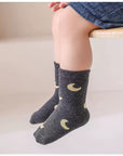 Baby wearing moon pattern socks – cotton baby socks in grey mix