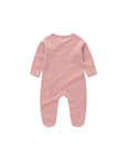Pink baby sleepsuit with small polka dot pattern back view in soft cotton