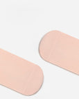 Pink heel and toe detail of baby cotton socks showing fine stitching
