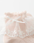 Pink lace frill baby socks with ribbon bow and floral embroidery