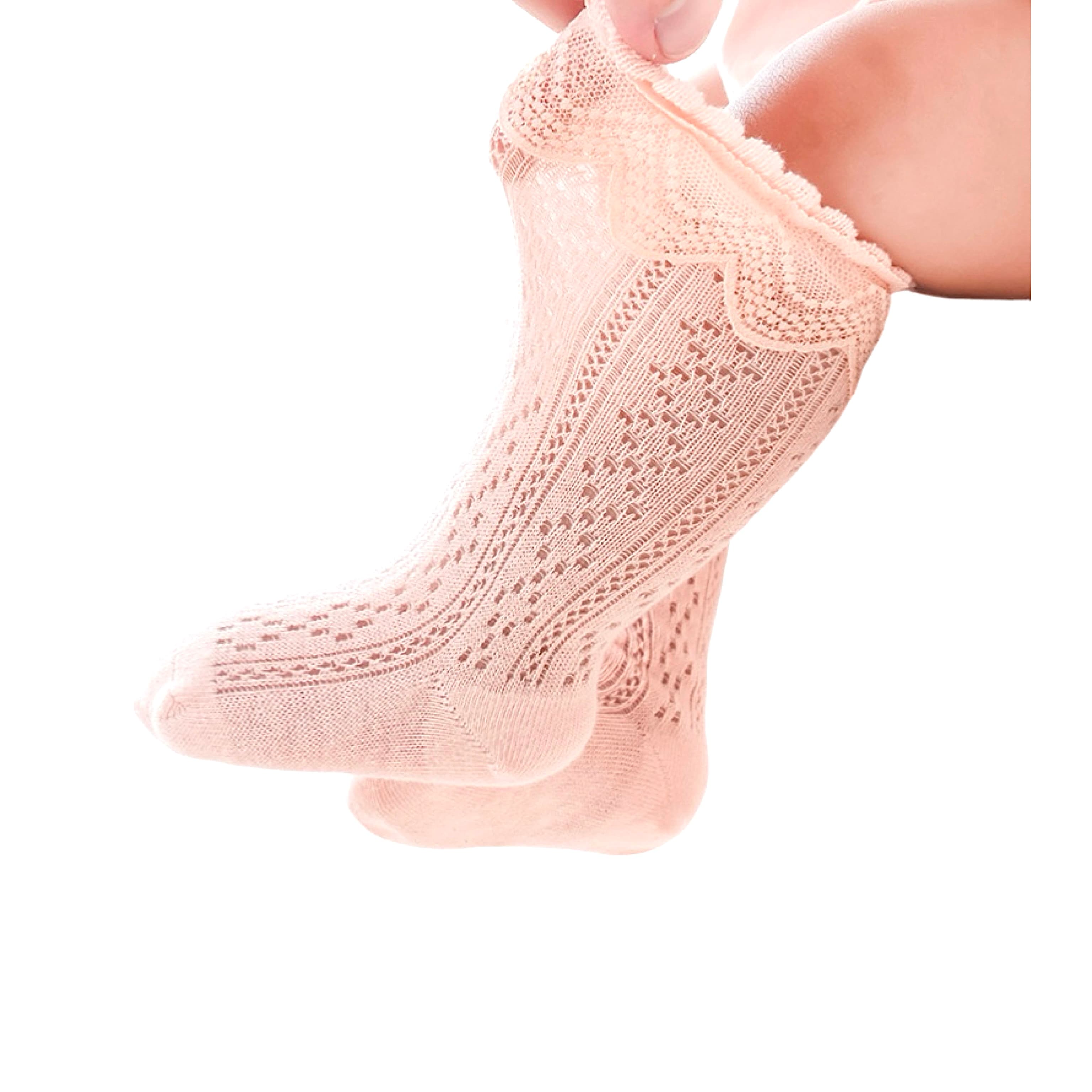 Toddler wearing pink lace knit baby socks – cute and comfortable cotton ruffle knee socks.