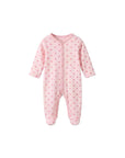Pink polka dot baby sleepsuit with front button closure in soft cotton fabric for comfortable everyday wear
